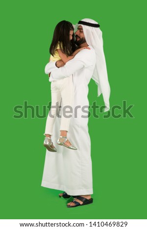 arab father playing with daughter Royalty-Free Stock Photo #1410469829
