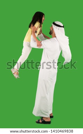 arab father playing with daughter Royalty-Free Stock Photo #1410469838