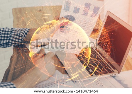 Media network theme hologram with man working on computer on background. Concept of internet communication. Double exposure.