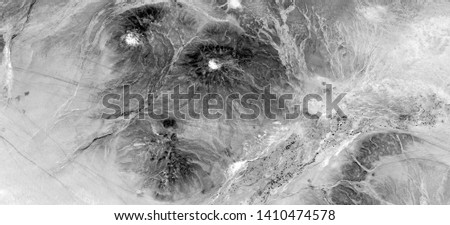 the first human, allegory, abstract naturalism, Black and white photo, abstract photography of landscapes of the deserts of Africa from the air, aerial view, contemporary photographic art, 