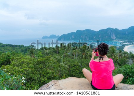 happy young cute girl relaxing woman resting women hipster guiding 
female travelling planning stuff long weekend idea at beautiful blue 
paradise tropical coast beach PP Island Krabi Phuket Thailand
