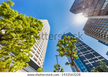 Fresh green and urban buildings