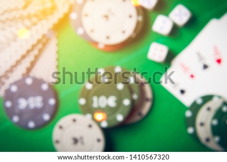 defocusing 4 aces cards on green cloth. Playing casino cards. Cash game. Winning the game top view