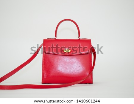 Red women's handbag isolated on white background - Image
