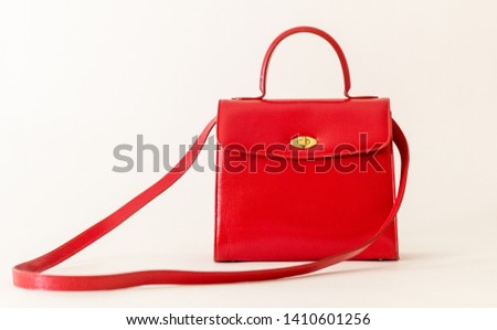 Red women's handbag isolated on white background - Image