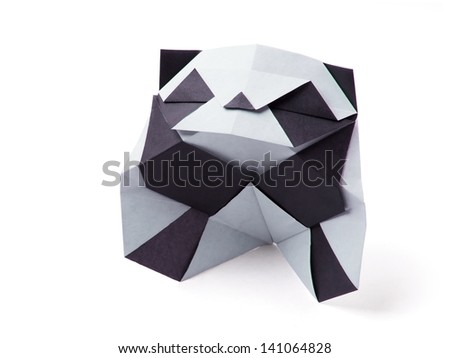 Origami paper panda bear on a white background