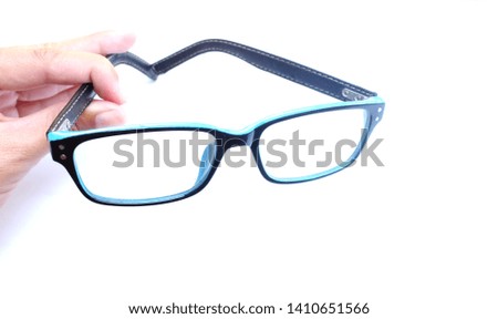 close up and top view holding glasses on a white background