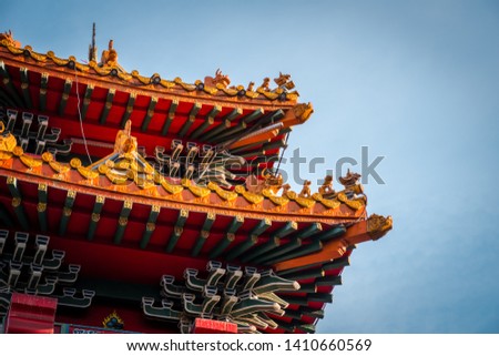 The close up of roof top of The Chinatown Gate at Yaowarat road in Bangkok, Thailand. The roof of Chinese ancient style. 