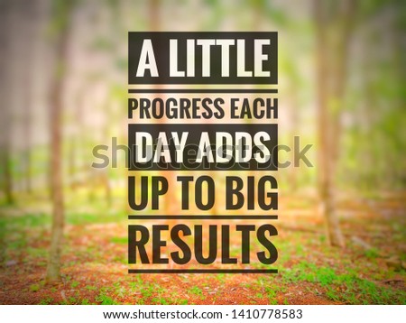 inspirational motivation words A LITTLE PROGRESS EACH DAY ADDS UP TO BIG RESULT on blurry woodlands 