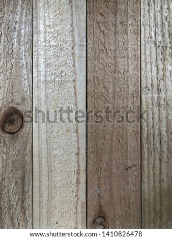 Wood boards with distressed weathered rough grain texture. Old country rustic barn wood or wooden floor.
