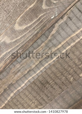 Wood boards with distressed weathered rough grain texture. Old country rustic barn wood or wooden floor.