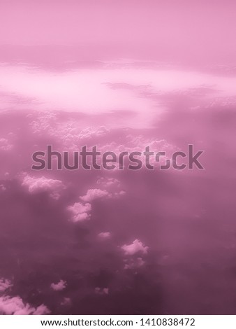 Blurred colored view of the sky from an airplane window