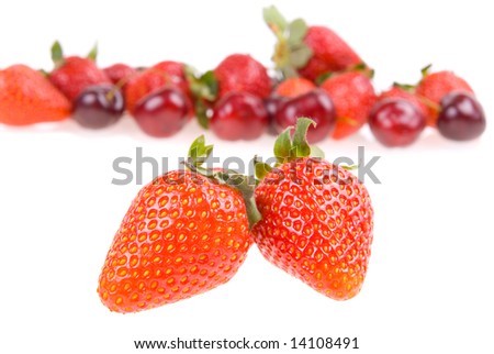 sweet red fresh strawberry on strawberry and cherry background