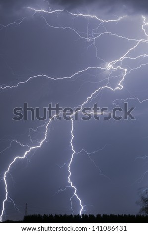 Lightning zigzags all over the picture