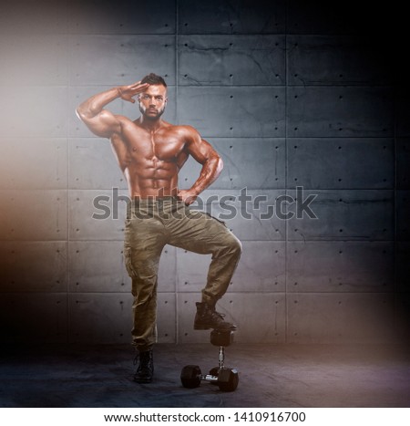 Strong Muscular Soldier Standing Tall. Military Fitness Royalty-Free Stock Photo #1410916700