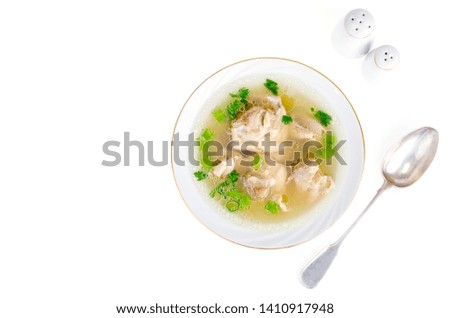 Broth with chicken meat Isolated on White background. Studio Photo