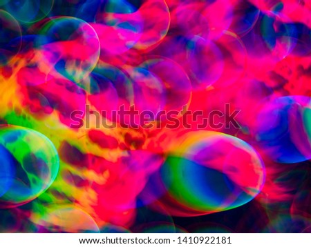 Sweet rainbow disco gradient. Natural lighting effects. Background image is abstract blurred backdrop. Defocused urban abstract texture. Ecological ideas for your graphic design, banner, or poster