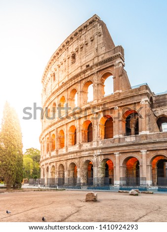 Colosseum, or Coliseum. Morning sunrise at huge Roman amphitheatre, Rome, Italy Royalty-Free Stock Photo #1410924293