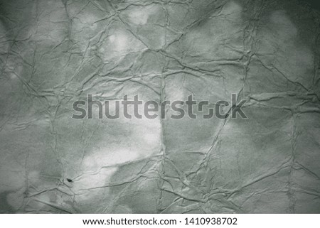 Old background with dust and dirty stains. Blank aged paper sheet. Vintage and antique art concept. Texture like cardboard, stone, concrete or natural marble. Poster mockup. Сloseup studio shot. Toned