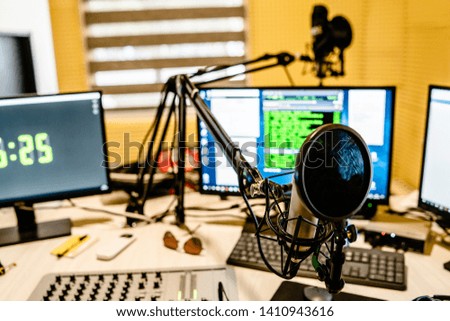 Microphone at the radio station studio broadcasting news
