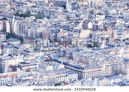 aerial view over Paris rooftops - metropolis traditional and modern architecture