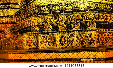 wat Pho as a famous landmark in Bangkok, Thailand. Picture taken at night time. The temple is opened at night as small gate for people to meditate or walk in peace and closed at midnight.