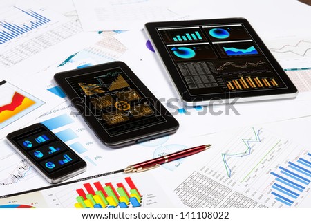 Image of working place with mobile phone, ipad and tablet PC