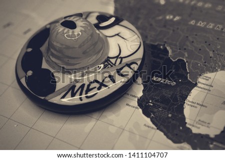 Symbol of Mexico on the world map travel background