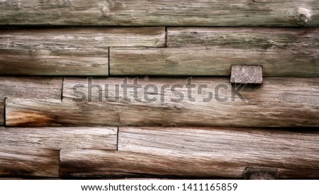 Abstract Background Texture Detail of a Wooden Wall with cracks and grunge.