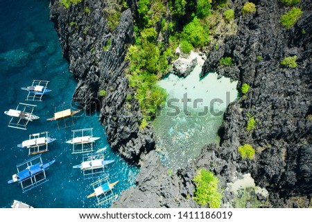 Aerial view of Secret beach in El Nido, Palawan, Philippines Royalty-Free Stock Photo #1411186019