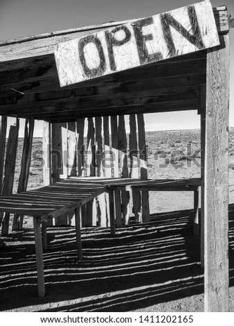 Abandoned wooden vendor shed inside Monument Valley. 2008.