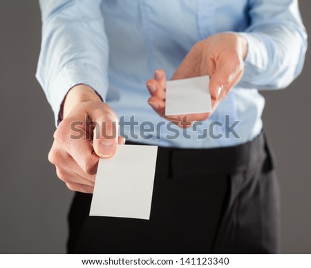 Businesswoman giving business card to you, you can add your text on it