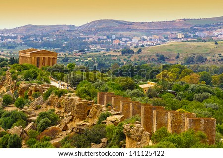 Sunset in Temple of Concordia  - Valley of the Temples, Agrigento, Sicily, Italy Royalty-Free Stock Photo #141125422