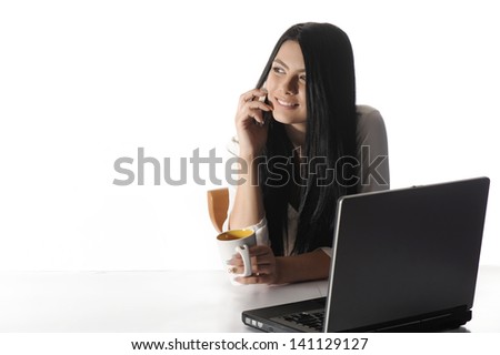 Portrait of happy business woman with a laptop