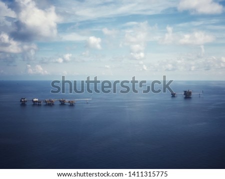 Aerial view of offshore living quarter platform or Offshore rig blue sky or Offshore oil and gas Accommodation Platform or Living Quarter and Production plant under a beautiful weather or blue sky