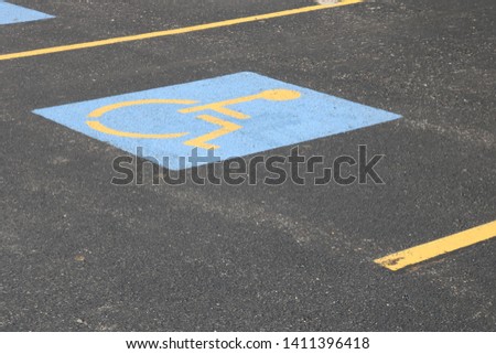 Handicapped parking spots in outdoor parking lot 