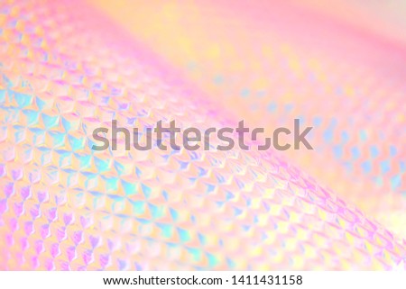 Iridescent colorful feminine spectrum pastel candy colored abstract wallpaper background texture with glowing diagonal honeycomb pattern Royalty-Free Stock Photo #1411431158