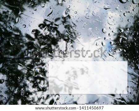 Raindrops on the window background reflecting nature template 