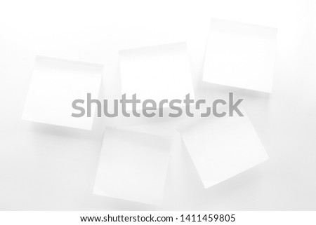 Closeup white blank paper stick note isolated on white background, white paper post it, Empty white stick note for communication, Paper card or stick note for add text message 