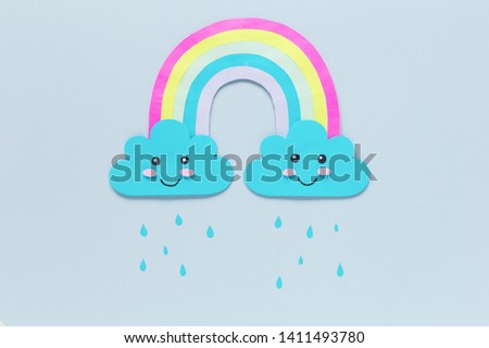 Background with cute Rainbow Rain Clouds of paper kawaii, handmade