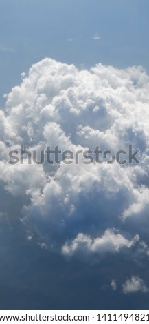 Cloudy sky view on plane