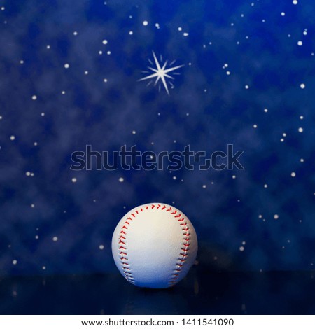 Baseball against a night sky
