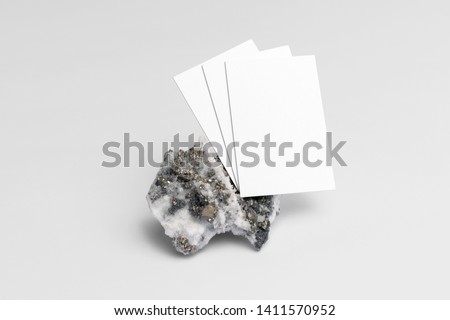 Real photo, business cards branding mockup template, isolated on light grey background, with marble and floral elements to place your design.