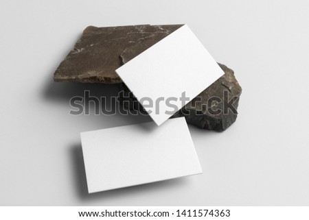 Real photo, business cards branding mockup template to place your design, isolated on light grey background, with marble, granite, gloden and floral elements.
