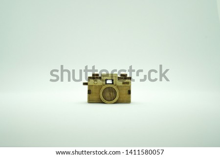 isolated mock-up wood's camera on white background.
