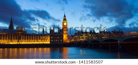 Big Ben and Westminster palace in London at night. abstract colorful image
