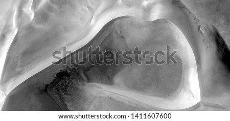 Hug, allegory, abstract naturalism, Black and white photo, abstract photography of landscapes of the deserts of Africa from the air, aerial view, contemporary photographic art, 