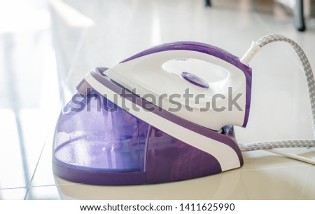 Stream iron housework ironed electric tool clean in the room ,Household duties, taking care of clothes concept.