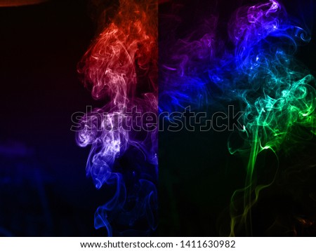 Colored smoke on black background. abstract art
