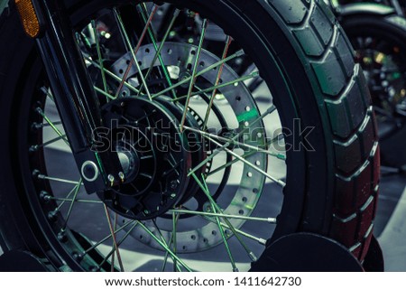 Close up wheel of modern motorcycle.